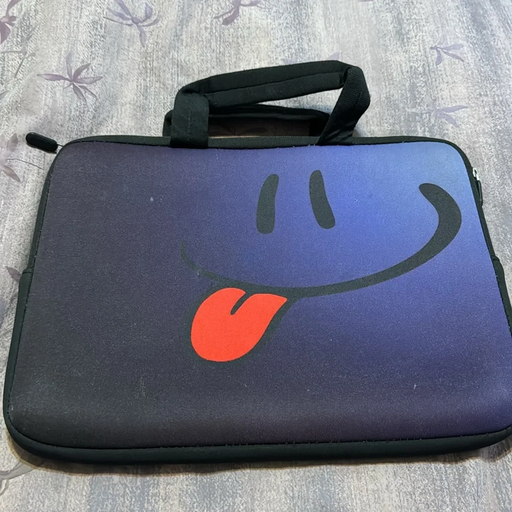 iColor padded Chromebook case. Used. Small rip in lower right hand corner.